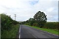 Road descending near Cansdale Farm in YO25 3HS