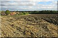 Ploughed field by Tadlow in Tadlow