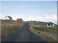 Single track road heading north, Sandsayre Wick. in ZE2 9HP