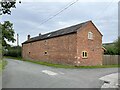 Barn conversion at Cae-lica road junction in Willington Worthenbury Community