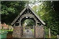 Lychgate and interesting brickwork, St Peter's Church, Humberston (1) in DN36 4RL