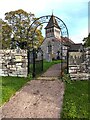 Elegant metalwork at the churchyard entrance, Talachddu, Powys in LD3 0UF
