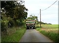 Tractor filling Rectory Road in Broome