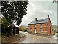 Bus shelter and cottage on the B4389 in SY16 3EH