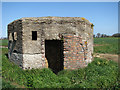 Pillbox beside the road in NR10 4PF