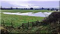 Flooded field on south side of River Ellen south of East Mill Farm in CA7 3BL