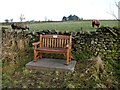 Memorial bench near Chesterfield Farm in NE47 6HJ