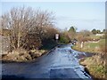 A wet road, Thornton in EH42 1QT