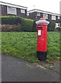 Christmas-themed hat on a Caerleon pillarbox in NP18 3EZ