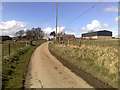 Farm road to Hill of Crimond Farm in AB51 0JX