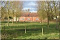 Buildings at Park Farm, seen from the riverside path in BA12 0HE