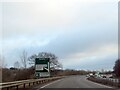 The A11 eastbound approaching junction for the B1077 in NR17 1ST