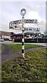 Cumberland County Council finger signpost at South End / Longmoor Road junction in CA7 9LR