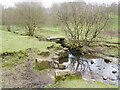 Old footbridge and ford in OL3 5JR