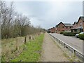 New housing estate path in M46 0PG