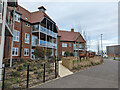 Flats facing roundabout on Rusper Road, Mowbray in RH12 6AP