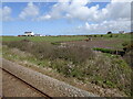 From a Chester-Holyhead train - Tractor at work near Llanfaelog in LL63 5ST