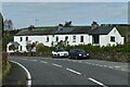 White cottages beside the A65 at Nook in LA6 1PD
