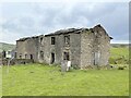 Abandoned farmhouse and barn at Brand Top in SK17 0SF