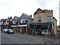 Post Office and shops on High Street, Dyserth in LL18 6BF
