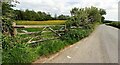 Field gateway on NE side of rural road south of Oakbank in LA9 6LJ