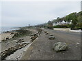 Shore Road (A815) and the shoreline of the Firth of Clyde, Innellan in PA23 7TA