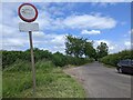 Lane to Mells, with a sign that needs a lick of paint in BA11 3RH