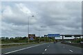 Motorway sign gantry over M53 in advance of exit for Wallasey in CH46 1RU