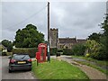 Car, post box, phone box, notice board, bin, church in South Barrow in BA22 7LP