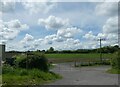 Field gate and farm track near Bushfield Farm in SO22 4HF