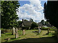 Churchyard and cottages, Grafton Underwood in NN14 3AA