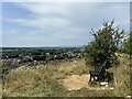 Bench on top of Verney Fields with views over Stonehouse beyond in GL10 2JZ