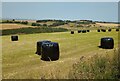 Field of plastic covered bales in EH49 6QU