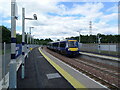 A Leven-bound train arrives at Cameron Bridge in KY8 2AU
