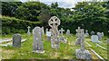 Medieval churchyard cross south of the Church of St Bruerdus in PL30 4LR