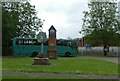 Beetley village sign and village clock, outside the school in NR20 4BJ