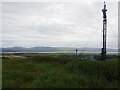 Mast on Brocklebank Wood hill and a view across Duddon Sands in LA18 5JT