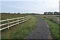 Path around the farm reservoir in Ely East Ward
