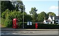 Elizabeth II postbox and telephone box on Station Road, Crowton in WA6 8HU