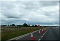Traffic cones blocking lay-by on eastbound A303 in BA22 8DX