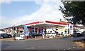 Esso Garage and Shops, Leatherhead Road in KT23 4PG