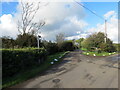 Llwybr yn gadael yr heol / Path exits the road in Wiston Community