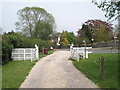 Looking down last section of the footpath from Crouchers as it meets the B2201 in PO20 1AU