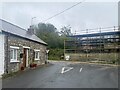 Old cottage and new building at Penrhiwpal in SA44 5QQ