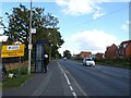 Bus stop on Norwich Road (B1172) in NR18 0EN