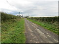 Minor road approaching Butterdales Holdings in DG12 6TQ