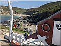 A shack above Pendeen Cove, with Portheras Cove in the background in TR19 7DZ