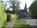 Looking down the hill to All Saints Church, Old Heathfield in TN21 8RL