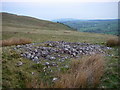 Remains of cairn above Pen-fathor in CF44 9JD