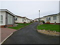 Access road and park homes on Homelands in TF1 5WR